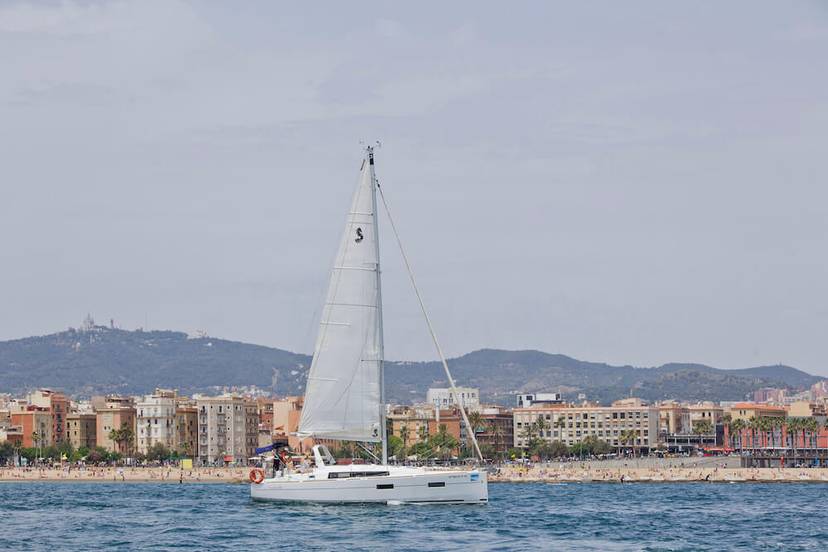 Watching the americas cup from a boat in Barcelona